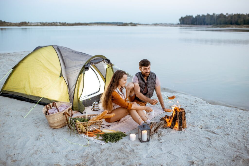 Couple at the campsite on the beach